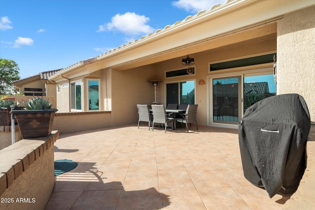 view of patio featuring outdoor dining area