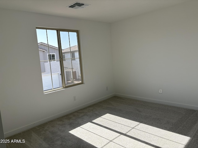 18001 W Lupine Ave, Goodyear, AZ 85338 - carpeted empty room featuring baseboards