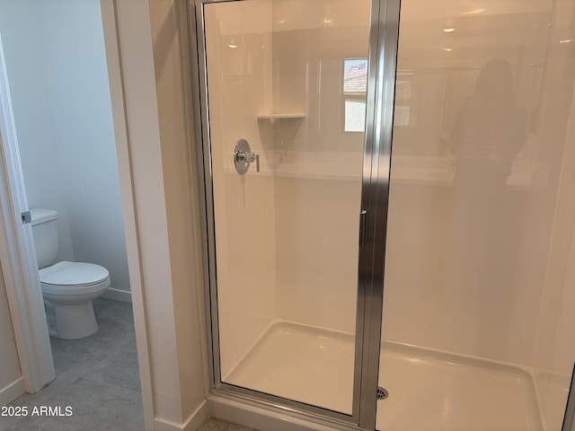 18001 W Lupine Ave, Goodyear, AZ 85338 - full bath with a stall shower, toilet, and baseboards