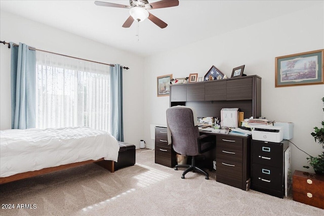 bedroom with light carpet and ceiling fan