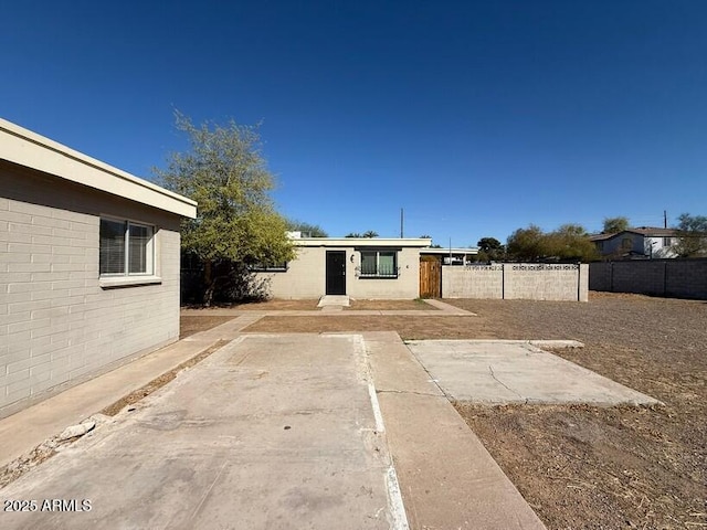 view of yard featuring a patio and fence