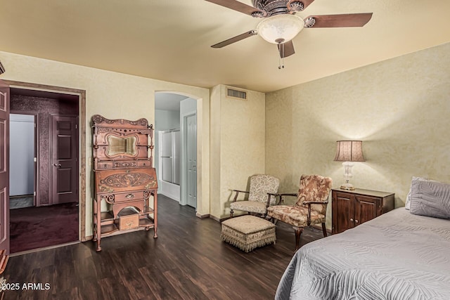 bedroom with ceiling fan, arched walkways, baseboards, wood finished floors, and visible vents