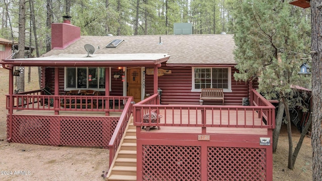 exterior space with a wooden deck