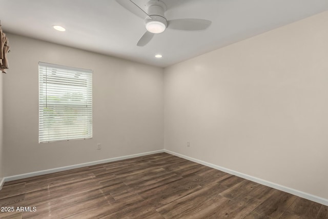 spare room with dark wood-style flooring, ceiling fan, recessed lighting, and baseboards