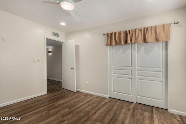 unfurnished bedroom with ceiling fan, visible vents, wood finished floors, baseboards, and recessed lighting