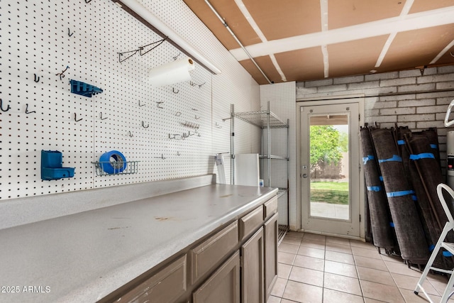 washroom with light tile patterned floors