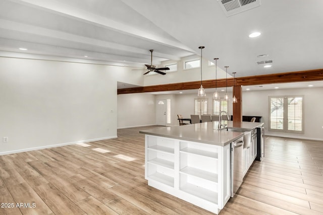 kitchen featuring visible vents, open shelves, open floor plan, light wood-type flooring, and white cabinetry
