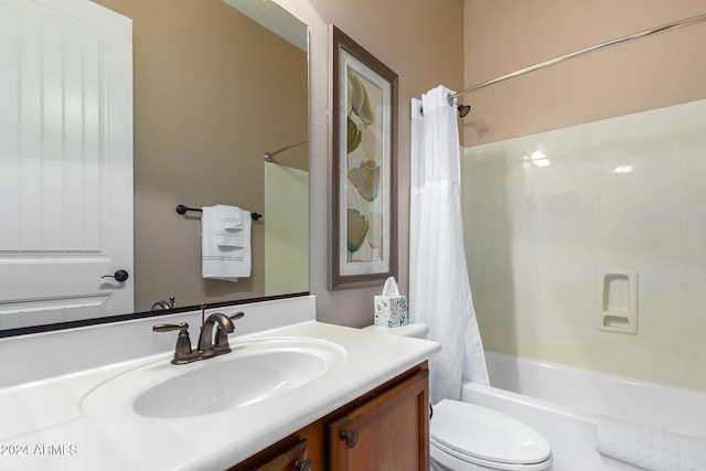 full bathroom with vanity, toilet, and shower / tub combo