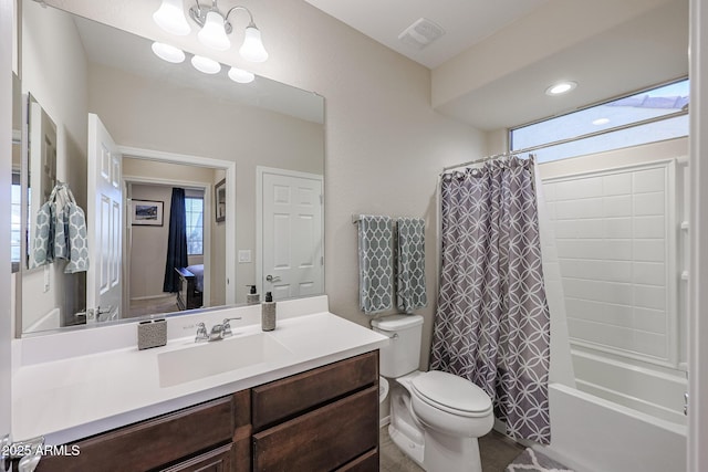 full bath with toilet, shower / bath combo with shower curtain, vanity, and visible vents