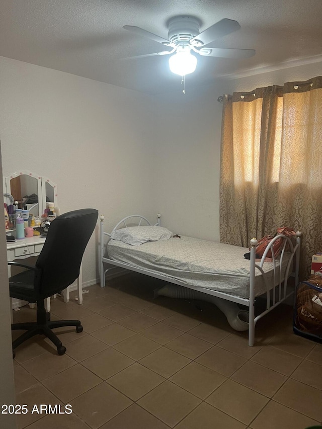 6226 W Citrus Way, Glendale, AZ 85301 - tiled bedroom with ceiling fan