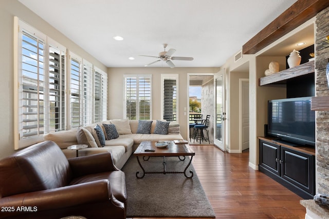 living area with visible vents, baseboards, recessed lighting, a ceiling fan, and dark wood-style flooring