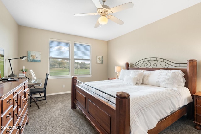 carpeted bedroom with baseboards and a ceiling fan