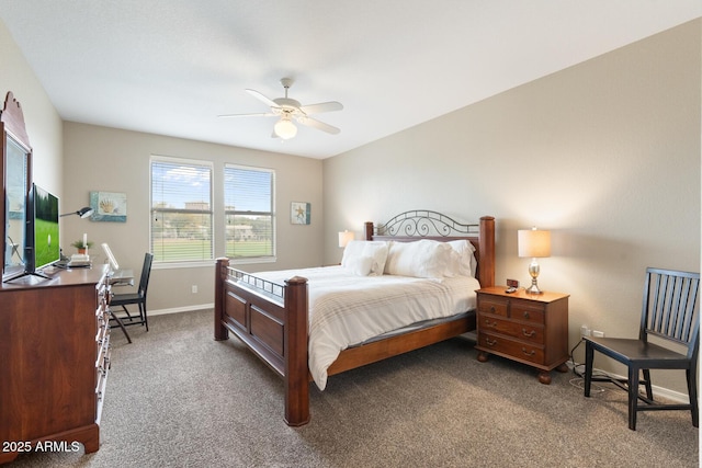 carpeted bedroom featuring baseboards and ceiling fan