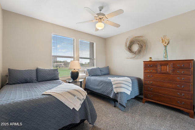 carpeted bedroom with a ceiling fan