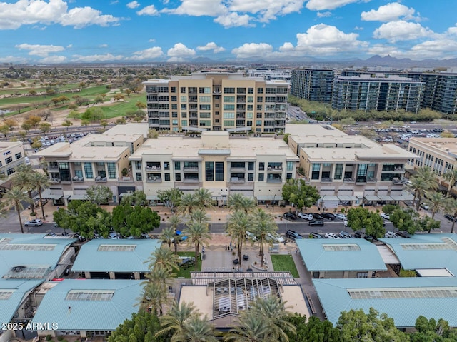 birds eye view of property featuring a city view