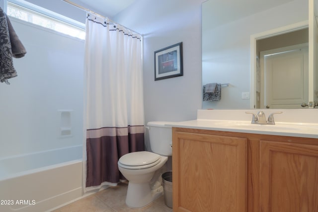 full bathroom with vanity, tile patterned flooring, toilet, and shower / bath combo with shower curtain