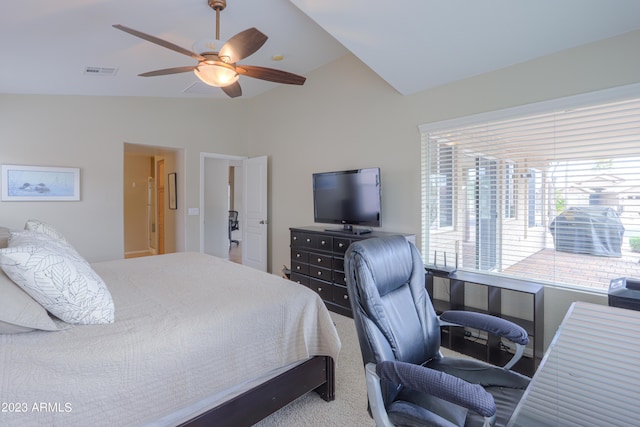 carpeted bedroom featuring lofted ceiling and ceiling fan