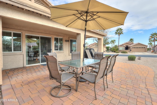 view of patio with a garage