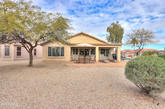 rear view of house with a patio area