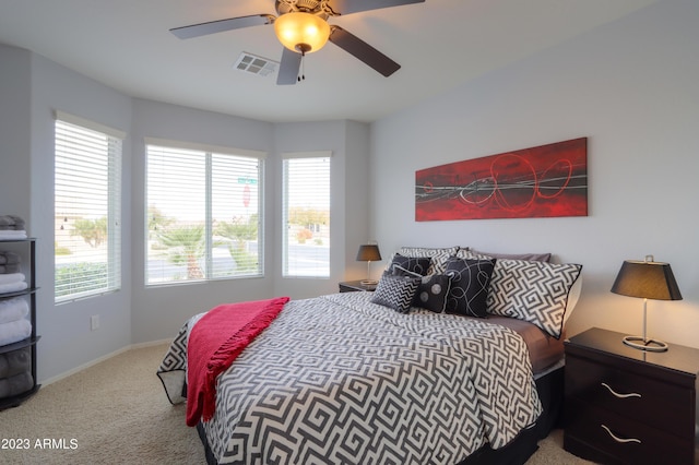 bedroom featuring ceiling fan and carpet flooring