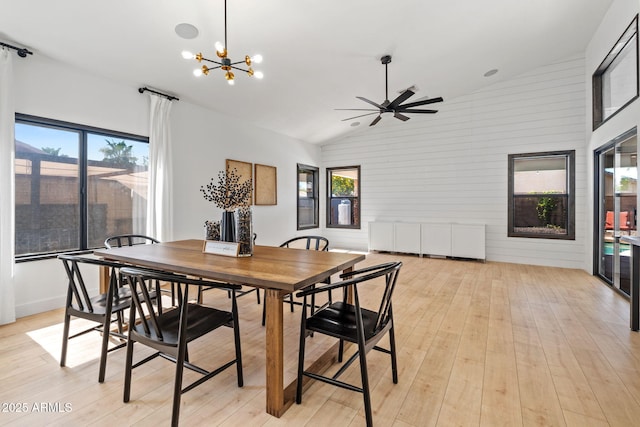 6935 W Monte Lindo St, Glendale, AZ 85310 - dining space featuring healthy amount of natural light, ceiling fan, lofted ceiling, light wood-style floors, and a chandelier