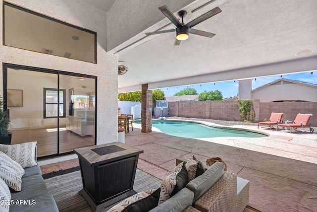 6935 W Monte Lindo St, Glendale, AZ 85310 - view of swimming pool with a fenced backyard, a patio, a ceiling fan, and an outdoor hangout area
