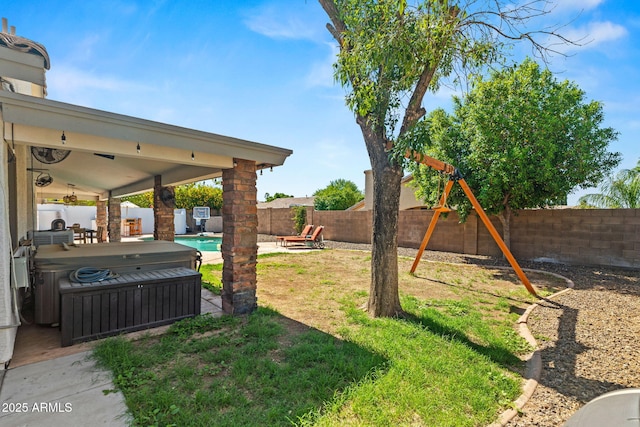 6935 W Monte Lindo St, Glendale, AZ 85310 - fenced backyard with a hot tub and a patio