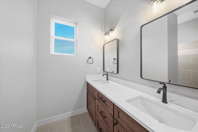 bathroom featuring tile patterned floors and vanity