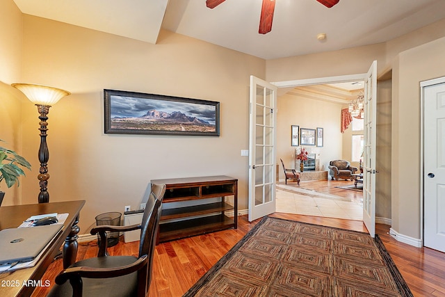 office area with hardwood / wood-style flooring, ceiling fan, and french doors