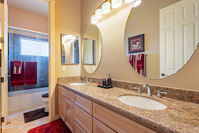 full bathroom with enclosed tub / shower combo, tile patterned floors, toilet, and vanity