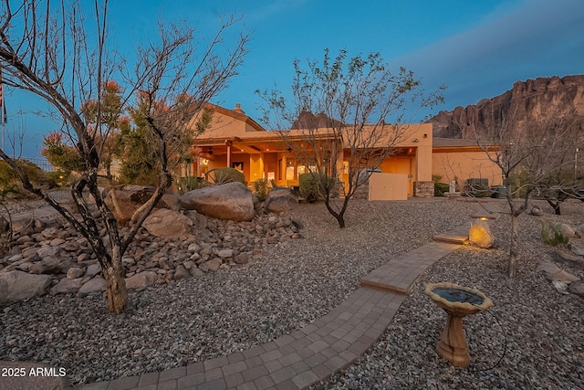 exterior space featuring a mountain view