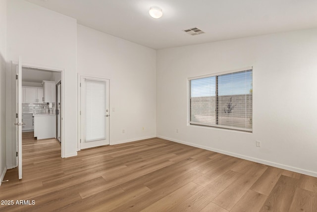10212 E Caballero St, Mesa, AZ 85207 - unfurnished room with light wood-type flooring and a sink
