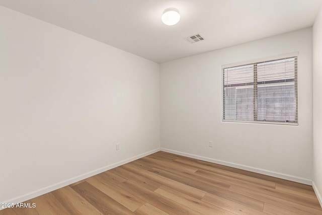 10212 E Caballero St, Mesa, AZ 85207 - unfurnished room featuring light wood-style flooring and baseboards