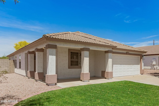 10212 E Caballero St, Mesa, AZ 85207 - view of front of house with a tile roof, driveway, stucco siding, an attached garage, and a front yard