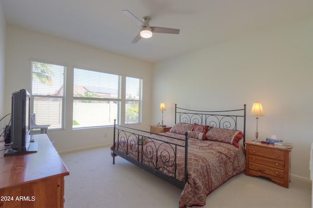 bedroom with ceiling fan and carpet flooring