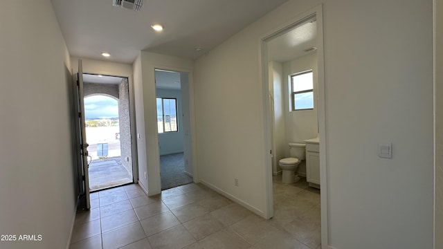 interior space with light tile patterned floors