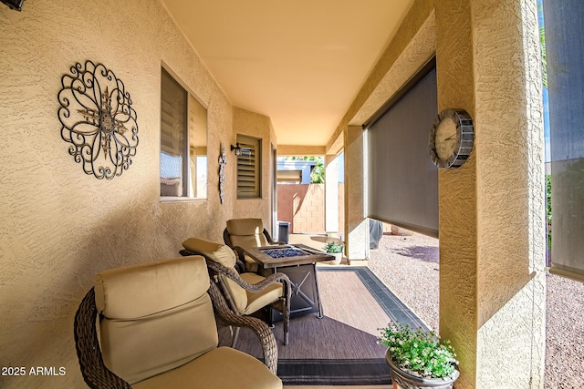 view of patio / terrace featuring an outdoor fire pit