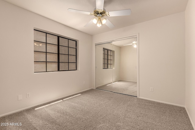 4313 N 29th Way, Phoenix, AZ 85016 - unfurnished bedroom featuring carpet, a closet, baseboards, and ceiling fan