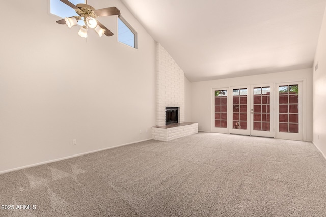 4313 N 29th Way, Phoenix, AZ 85016 - unfurnished living room featuring a ceiling fan, a brick fireplace, carpet flooring, high vaulted ceiling, and baseboards