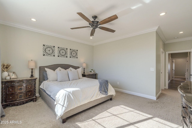 carpeted bedroom featuring ceiling fan and crown molding