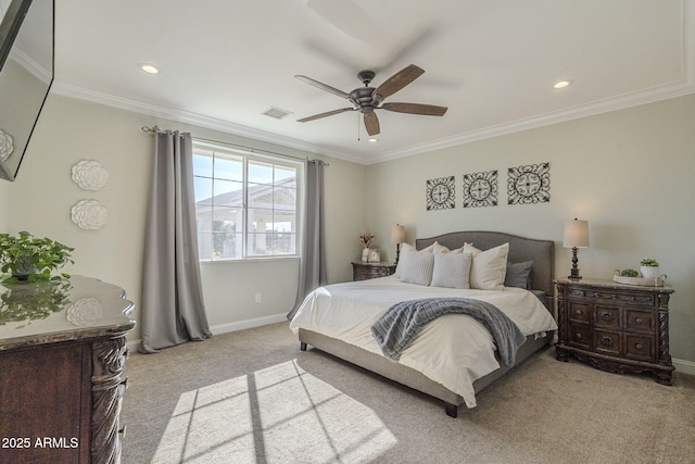 carpeted bedroom with ceiling fan and crown molding