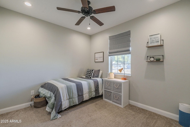 carpeted bedroom with ceiling fan