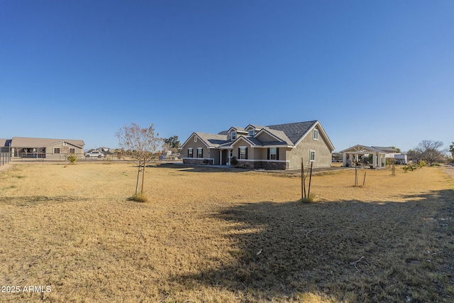 view of front of home featuring a front lawn