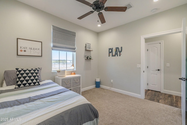 bedroom featuring ceiling fan and carpet