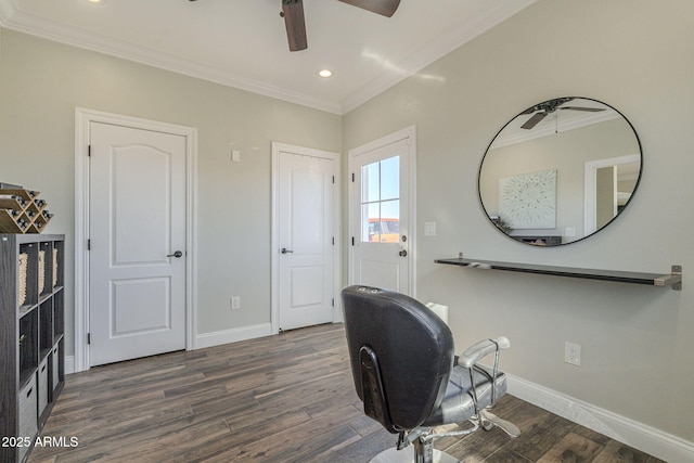 office area with ceiling fan, crown molding, and dark hardwood / wood-style floors