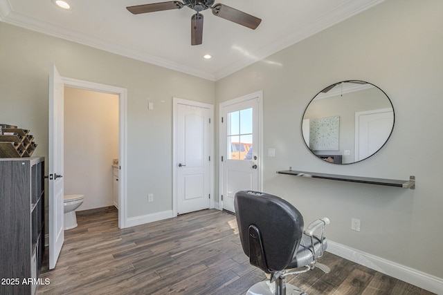 home office featuring ceiling fan, dark wood-type flooring, and crown molding