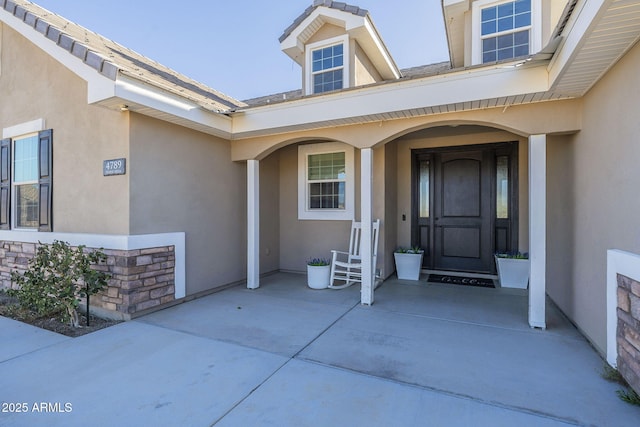 property entrance with a porch