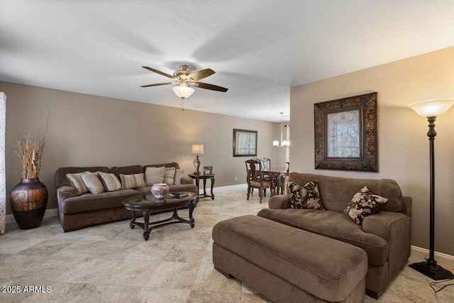 living room featuring ceiling fan