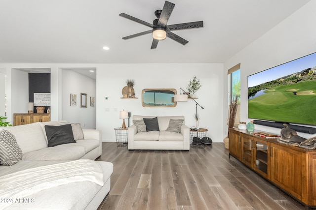 living room with hardwood / wood-style floors and ceiling fan