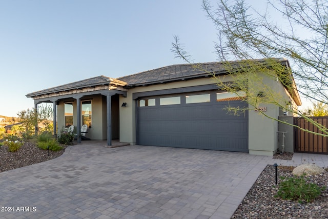 view of front of home with a garage